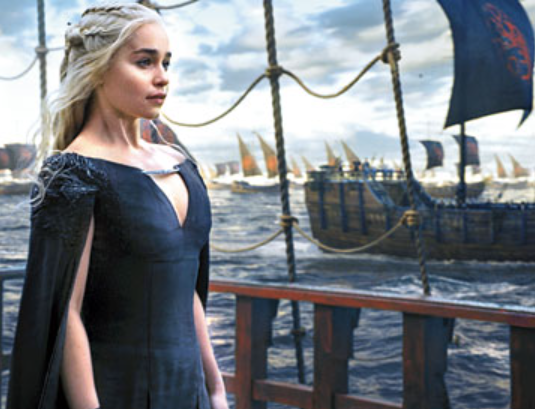 Daenerys on a ship with other ships behind her