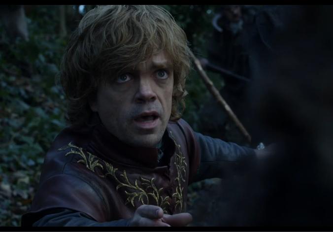 Tyrion Lannister speaking with a figure in front of him.